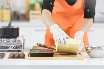 Woman making chocolate
