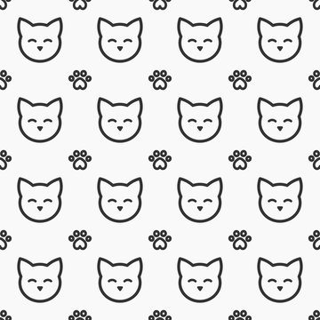 Cat faces and paws seamless pattern
