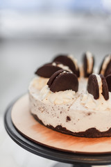 chocolate cake is photographed in the interior of the cafe