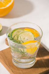 Fresh summer lemonade with citrus, orange and rosemary