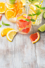 Infused water with fresh citrus fruits and ice