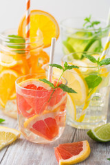 Infused water with fresh citrus fruits and ice