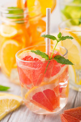 Infused water with fresh citrus fruits and ice