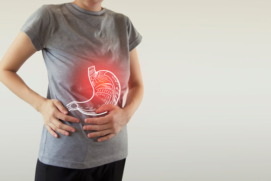 Digital composite of highlighted stomach of woman
