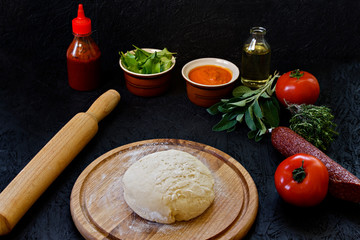 Dough. The process of making pizza. Ingredients for pizza