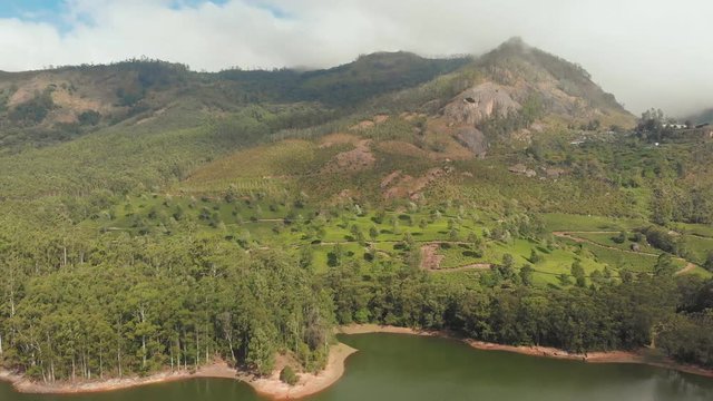 Aerial view beautiful nature with mountains and hills by Lake Mattupetty. Kerala State. Near the city of Munar.