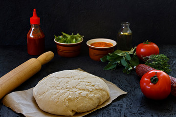 Dough. The process of making pizza. Ingredients for pizza