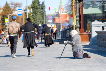 Moscow, Russia - April, 1, 2019: beggars begging near the Cathedral of Christ the Savior in Moscow,...