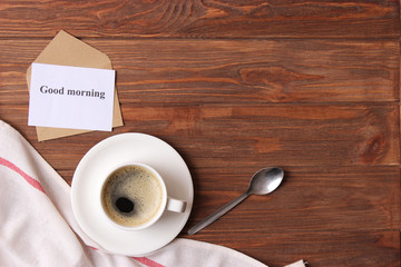  cup of coffee on wooden background top view. Good morning! Have a nice day