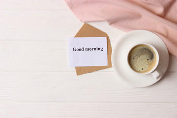  cup of coffee on wooden background top view. Good morning! Have a nice day