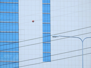minimal style building with street lamp and wire in city