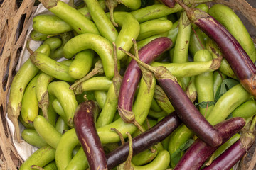 Background, eggplant in the basket
