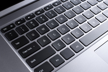 Close-up photo of stylish modern computer or notebook.
