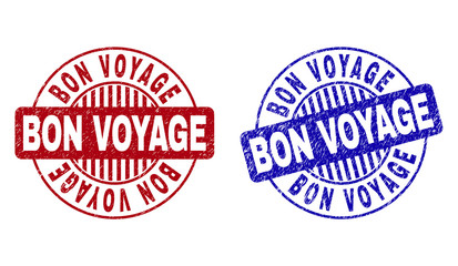Grunge BON VOYAGE round stamp seals isolated on a white background. Round seals with grunge texture in red and blue colors. Vector rubber watermark of BON VOYAGE title inside circle form with stripes.