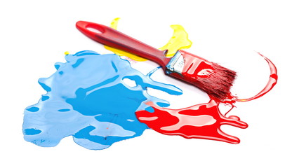 Paintbrush with spilled paint isolated on white background
