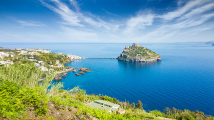 Ischia Island and famous landmark and travel destination Aragonese Castle or Castello Aragonese, Italy.