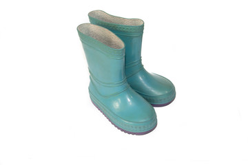 Children's blue rubber boots on a white background. Dry feet in the rain. Children's footwear. Rubber Shoes . Rubber boots.