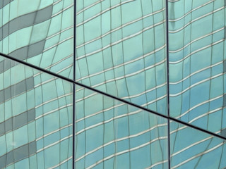 Fototapeta na wymiar abstract glass of office building window with reflection texture background