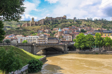 Fototapeta premium Walking in Tbilisi. Bridges over the Kura river in the Georgian capital