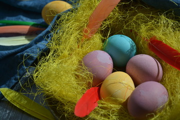 Fototapeta na wymiar Easter eggs in pastel colors on the table