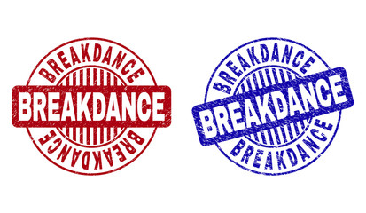 Grunge BREAKDANCE round stamp seals isolated on a white background. Round seals with grunge texture in red and blue colors. Vector rubber imitation of BREAKDANCE tag inside circle form with stripes.