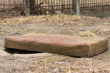 Old mattress sitting outside on curb