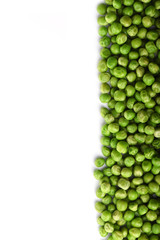 Green peas isolated on white background. Upright.