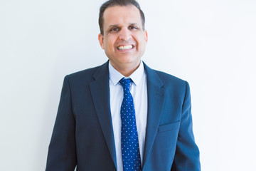 Middle age business man smiling to the camera