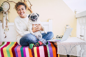 Happy couple at home with pretty middle age woman and funny dog pug - love and affection people...