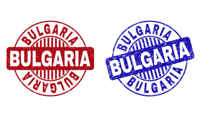 Grunge BULGARIA round stamp seals isolated on a white background. Round seals with distress texture in red and blue colors. Vector rubber watermark of BULGARIA tag inside circle form with stripes.