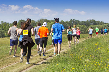 A lot of people on Marathon running in nature