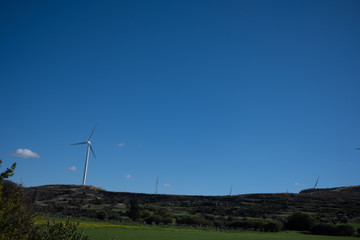 Fototapeta na wymiar Cypriot windmill landscape