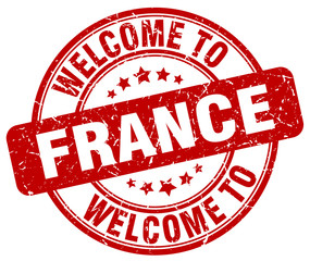 welcome to France red round vintage stamp