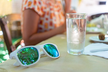white sunglasses on the table