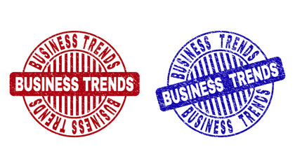 Grunge BUSINESS TRENDS round stamp seals isolated on a white background. Round seals with grunge texture in red and blue colors.