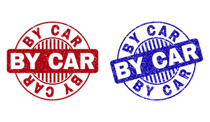 Grunge BY CAR round stamp seals isolated on a white background. Round seals with grunge texture in red and blue colors. Vector rubber watermark of BY CAR tag inside circle form with stripes.