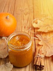 Homemade Pumpkin puree/jam on wooden background