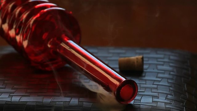 red empty glass bottle smoke nobody hd footage 