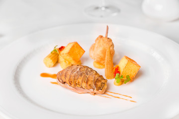 Quail in herbal Jus and variation of corn