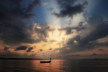 Naklejka na ściany i meble Sunrise in the morning boat and sea background