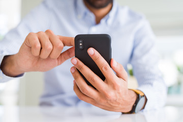 Close up of man using smartphone