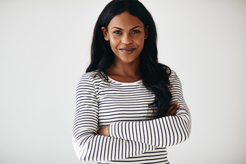 African American female entrepreneur standing confidently agains
