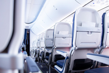 Seats in a cabin plane. passenger aircraft cabin. Low cost flights from airlines