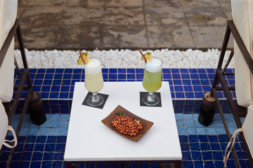 Resort hotel drinks and snack at pool side