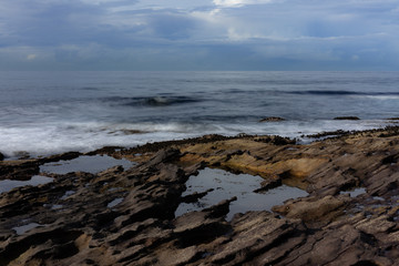 Fototapeta na wymiar rock coast of the sea