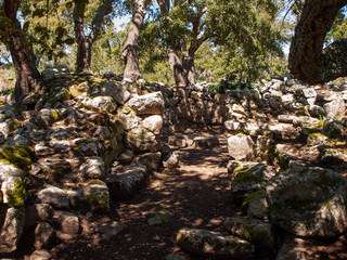 Sacred Source entrance archaeological site of Noddule in the megalithic circle and large circular hut in the new archaeological site in Nuoro Sardinia , ITALY