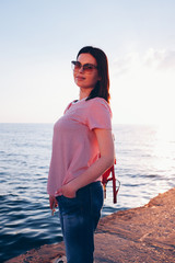 Young stylish woman posing outdoor