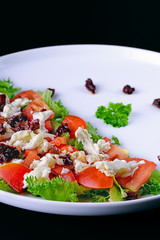 Fresh salad on black background