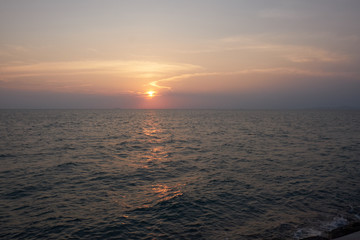 View of the sunset city from the pier in Pattaya