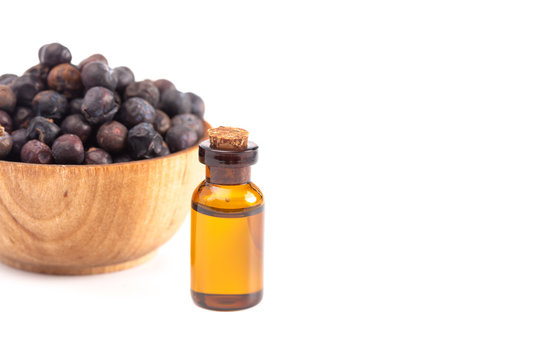 Juniper Berry Essential Oil Isolated On A White Background